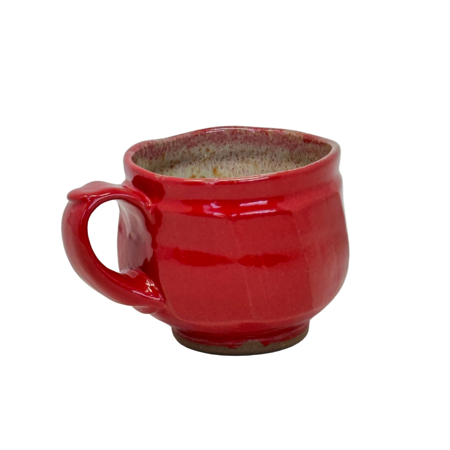 Red ceramic mug on a white background