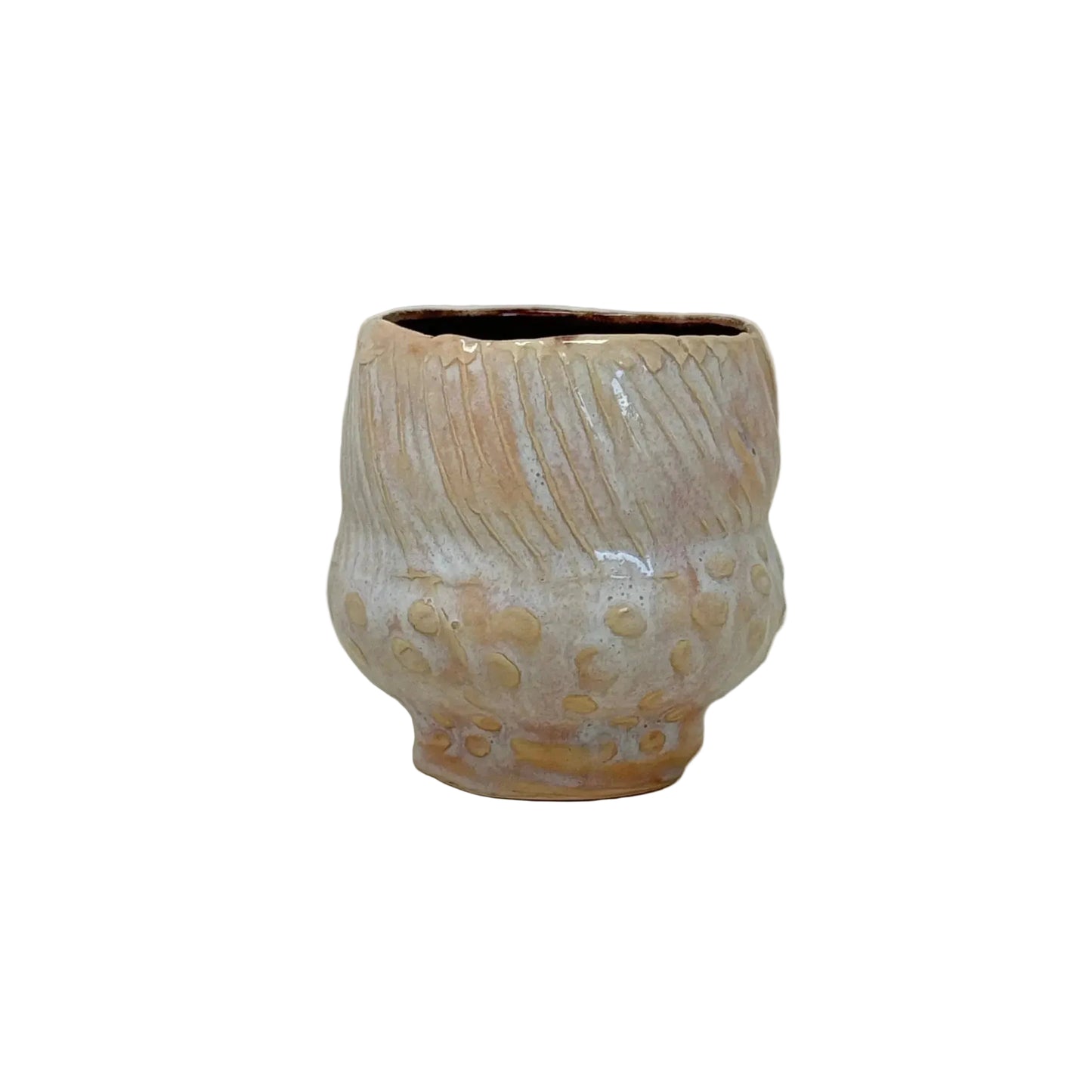 Ceramic cup with floral patterns on a white background