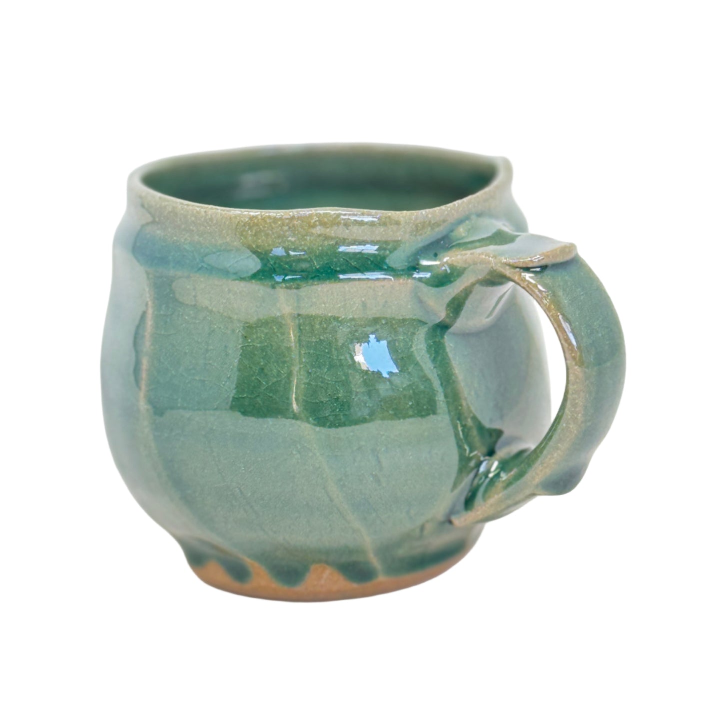 Green ceramic mug on a white background