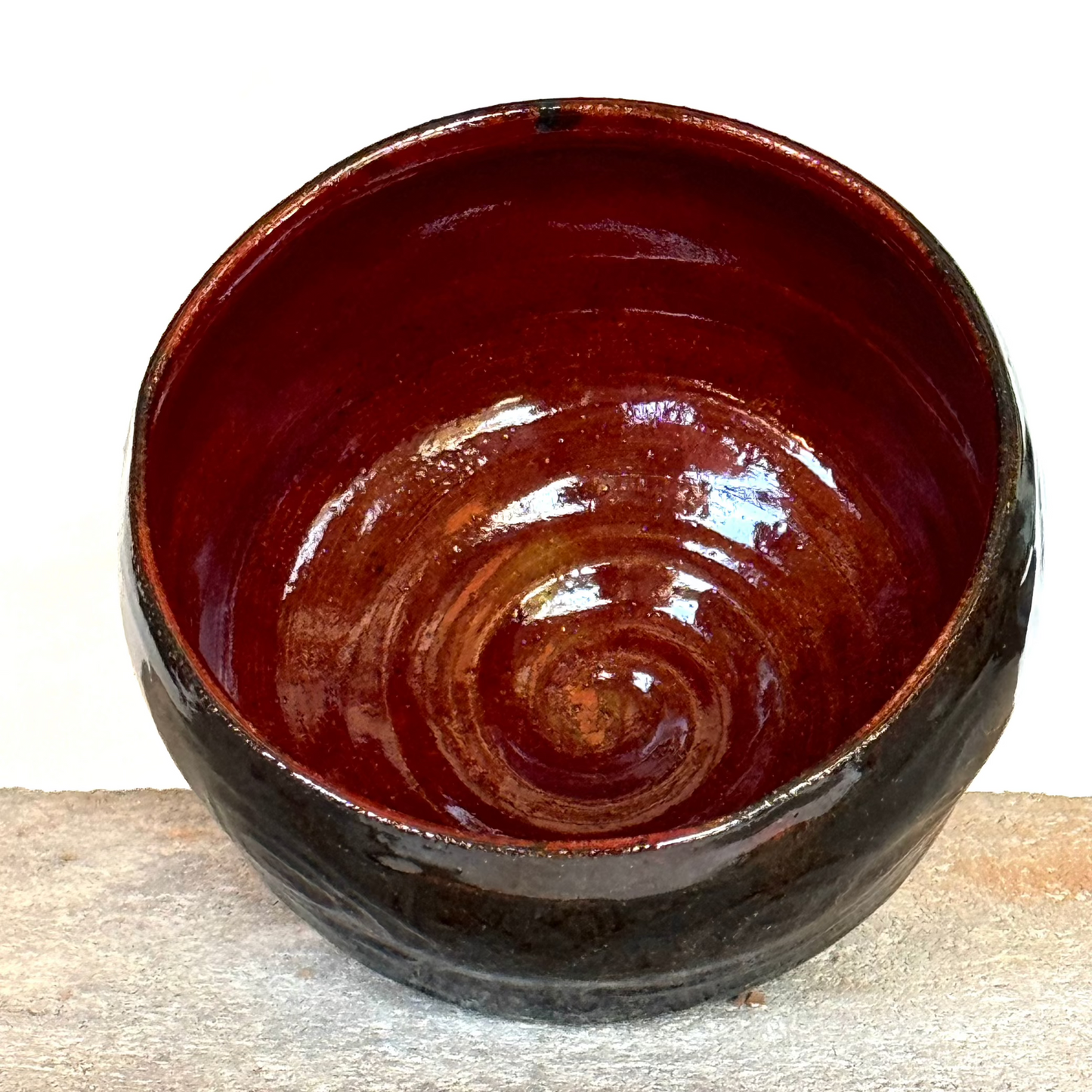 Brown red tea bowl inside