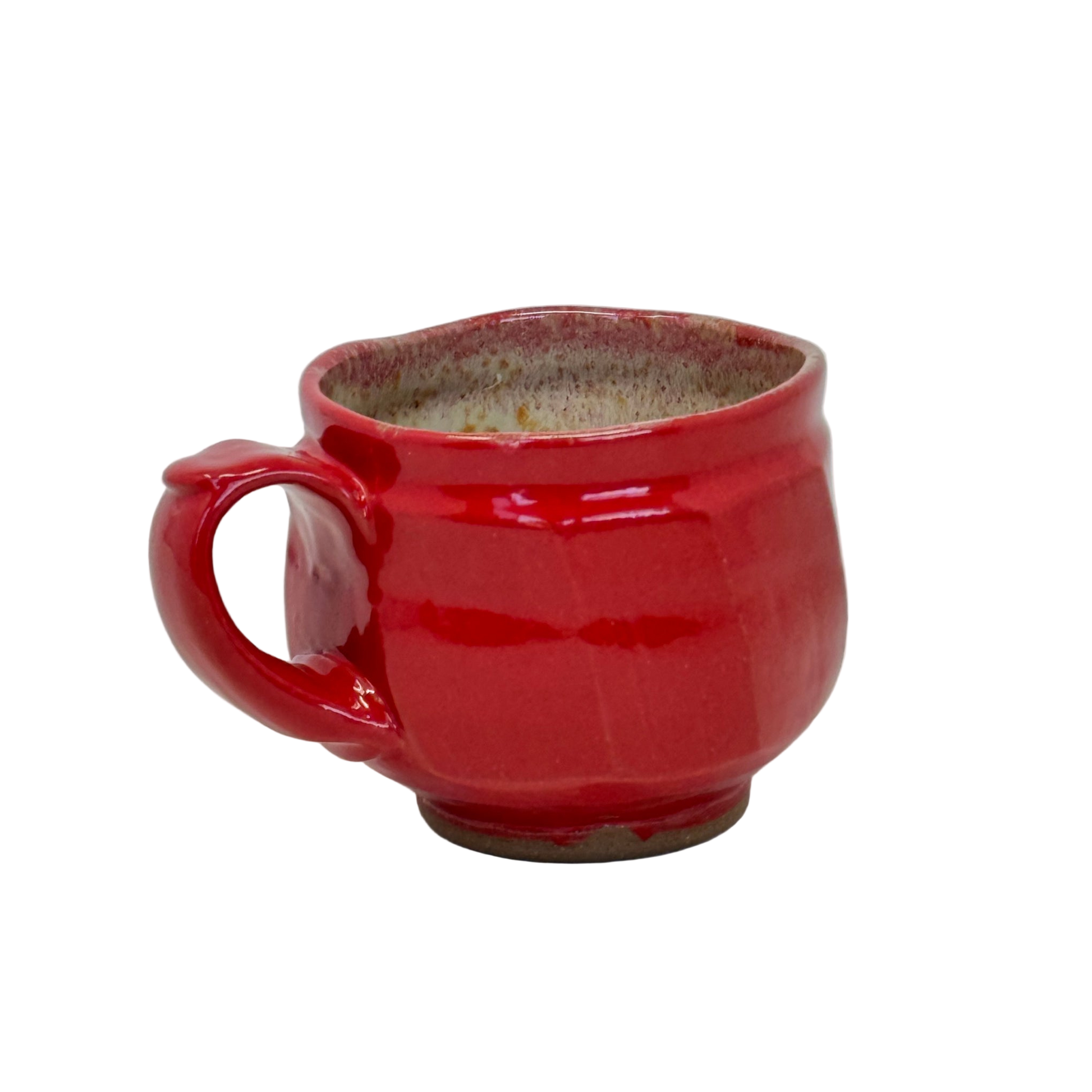 Red ceramic mug on a white background