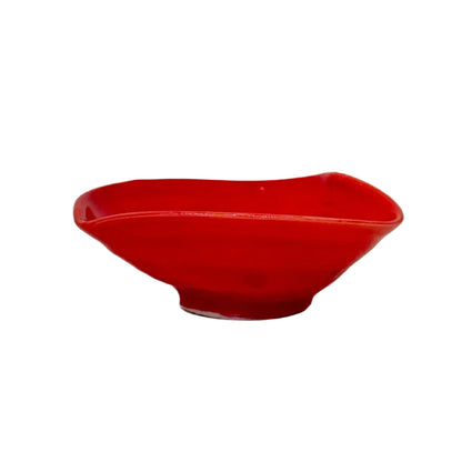 Red ceramic bowl on a white background