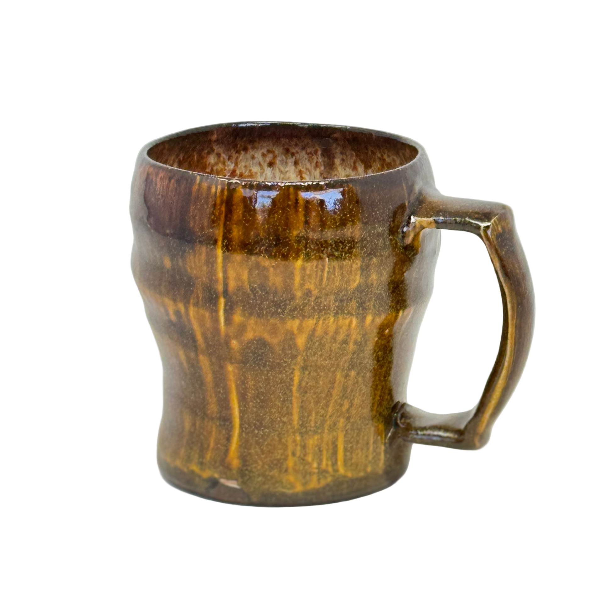 Brown ceramic mug on a white background