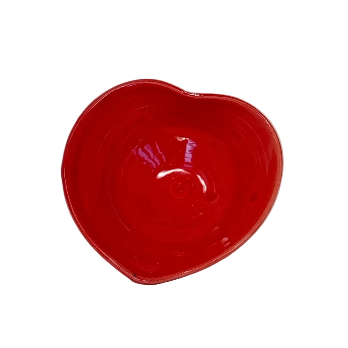Red ceramic bowl on a white background