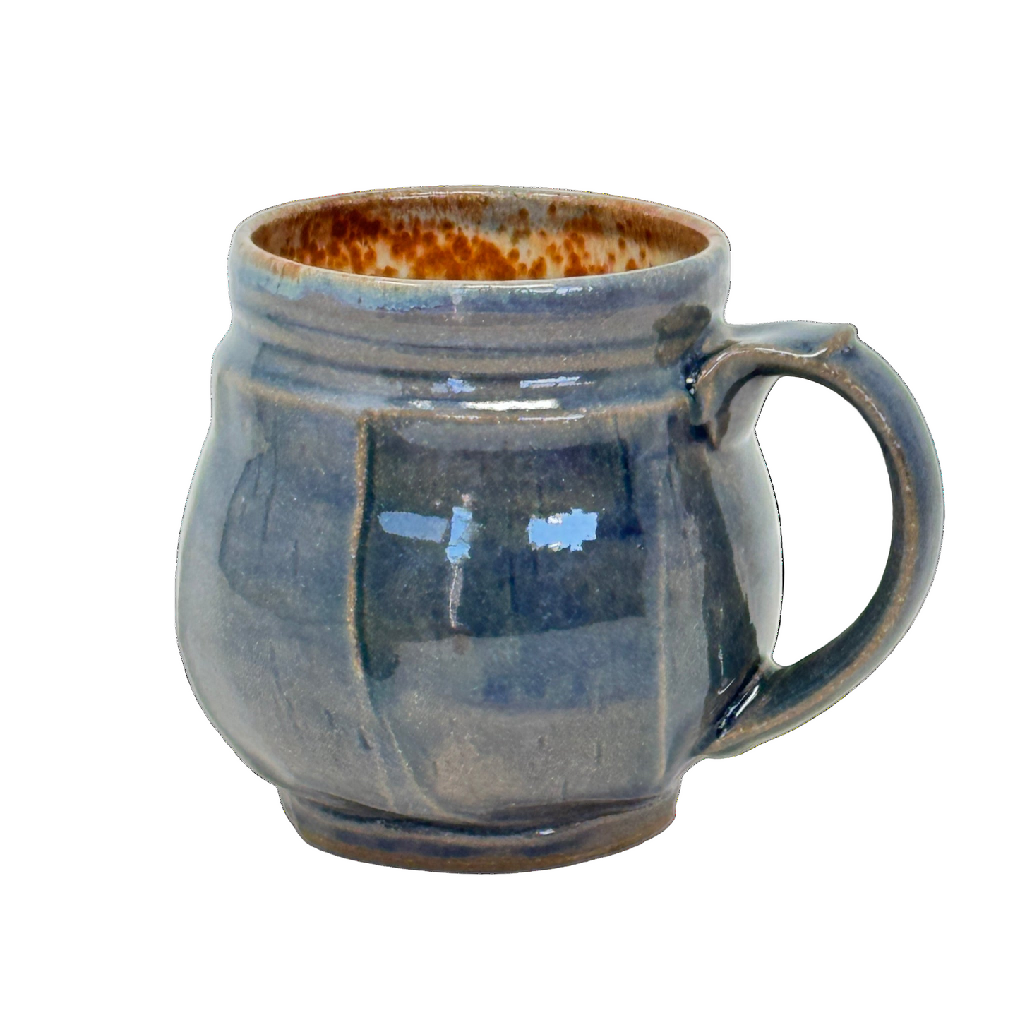 Blue ceramic mug with a handle on a white background