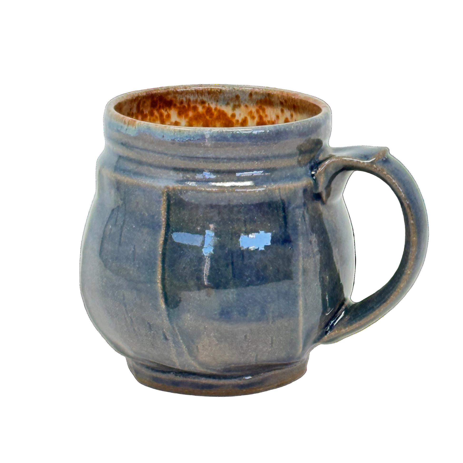Blue ceramic mug with a handle on a white background