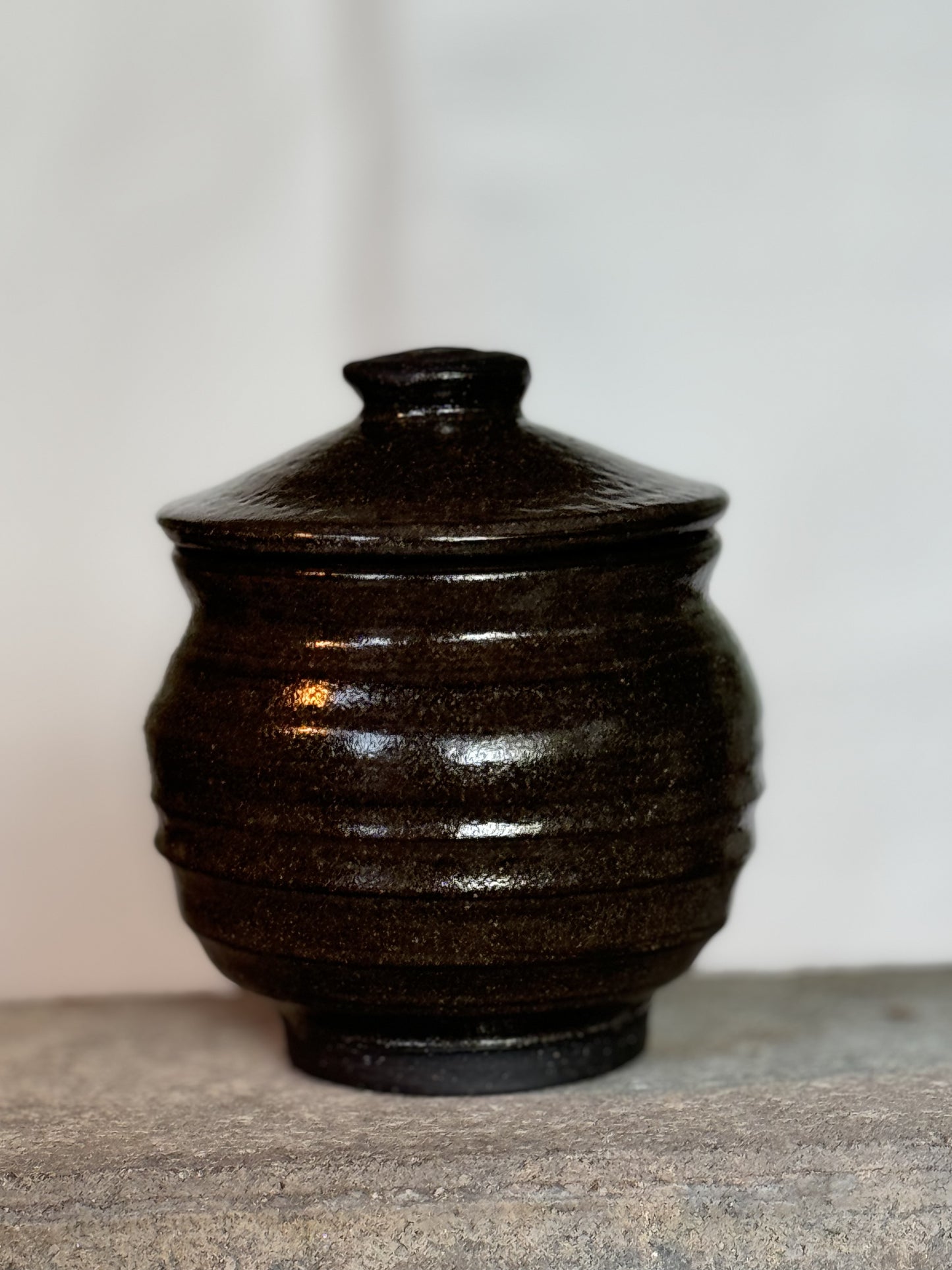 brown lidded jar